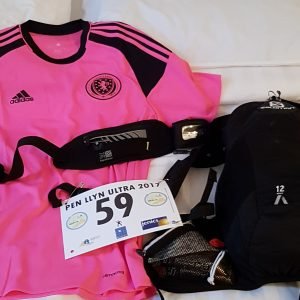 Bright pink scotland shirt that I wore for the Pen Llyn Ultra.