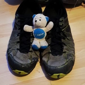 Unicef Teddy and battered old trail runners. 